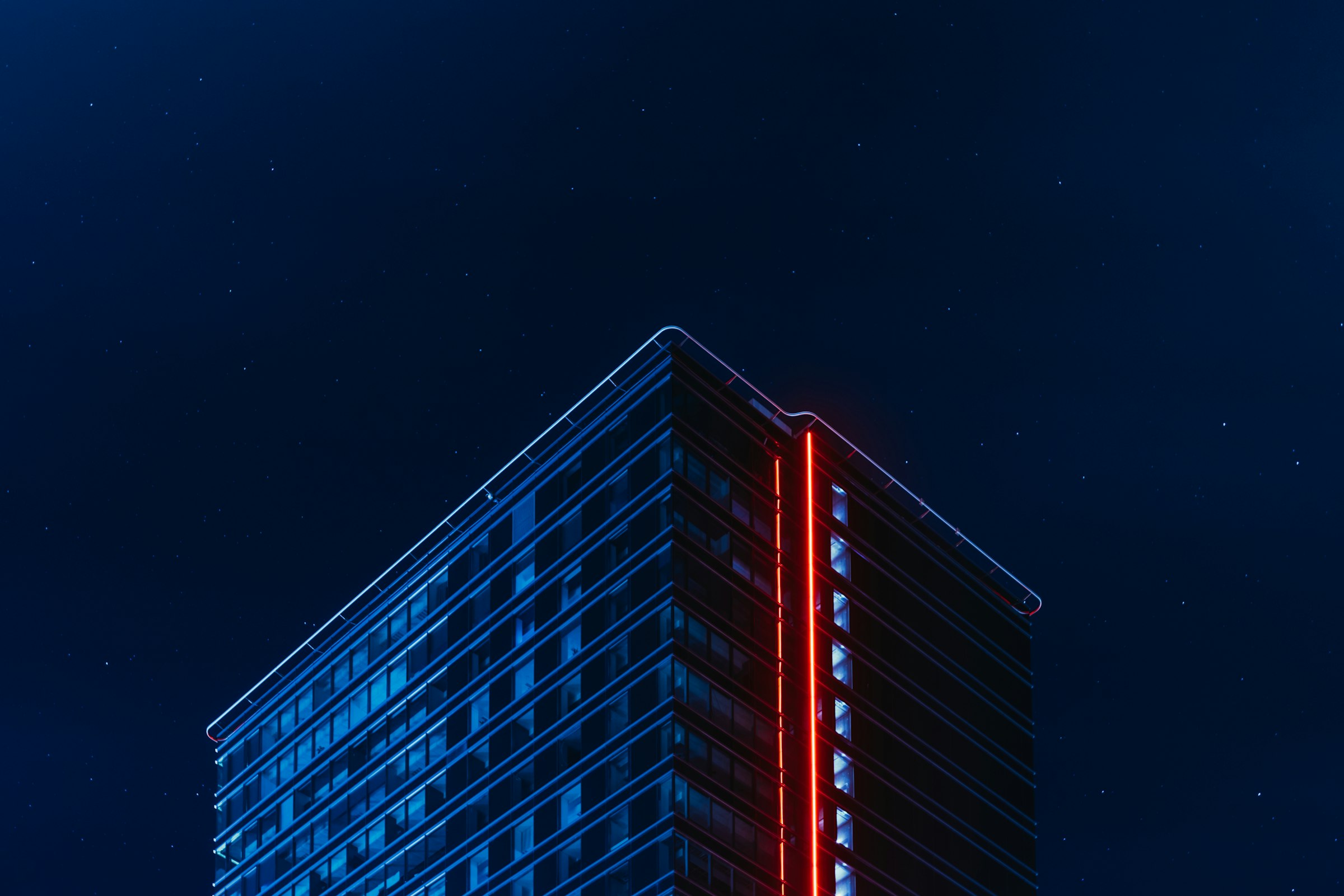 Modern glass building at night